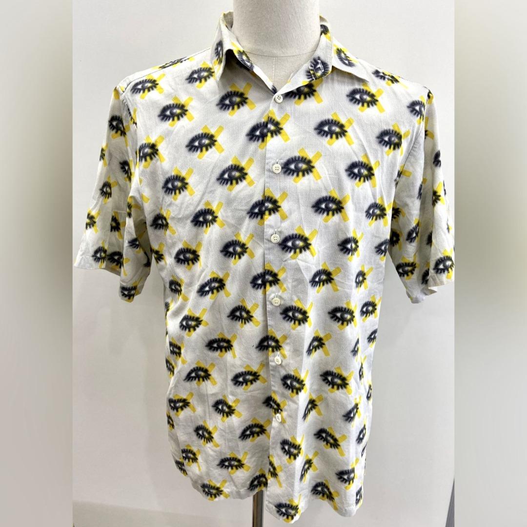 PRADA EYE LOGO SIZE:41 BUTTON UP SHIRT 227017286 MA, Men's Fashion, Tops &  Sets, Tshirts & Polo Shirts on Carousell