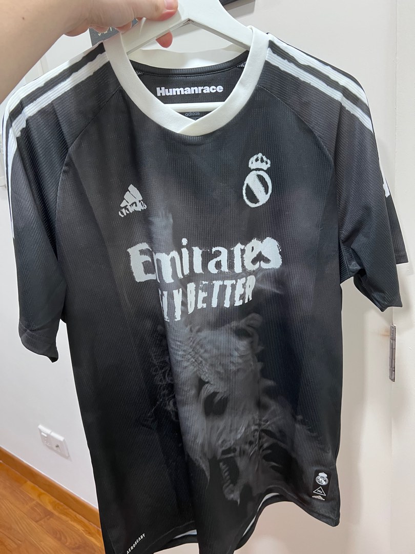 Real madrid hotsell human race shirt