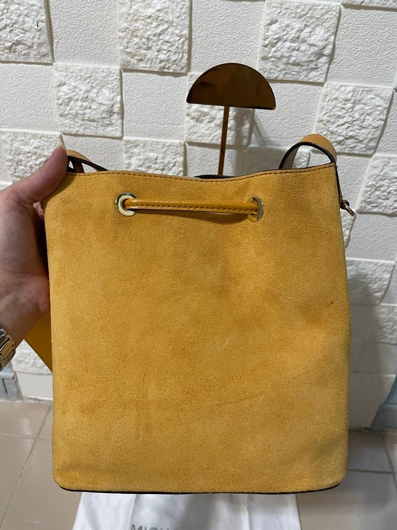 Authentic Cheapest Brand New Michael Kors carry small grommeted suede bucket bag in mustard comes with removable pouch pictured