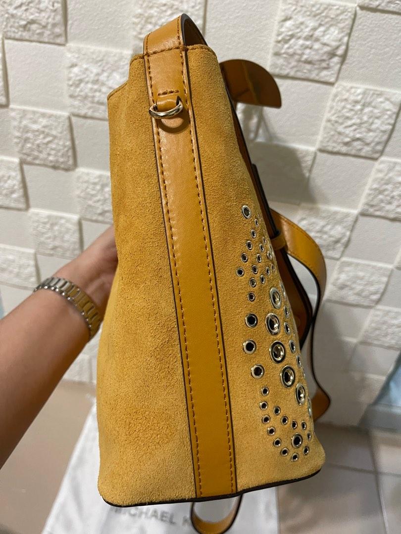 Authentic Cheapest Brand New Michael Kors carry small grommeted suede bucket bag in mustard comes with removable pouch pictured
