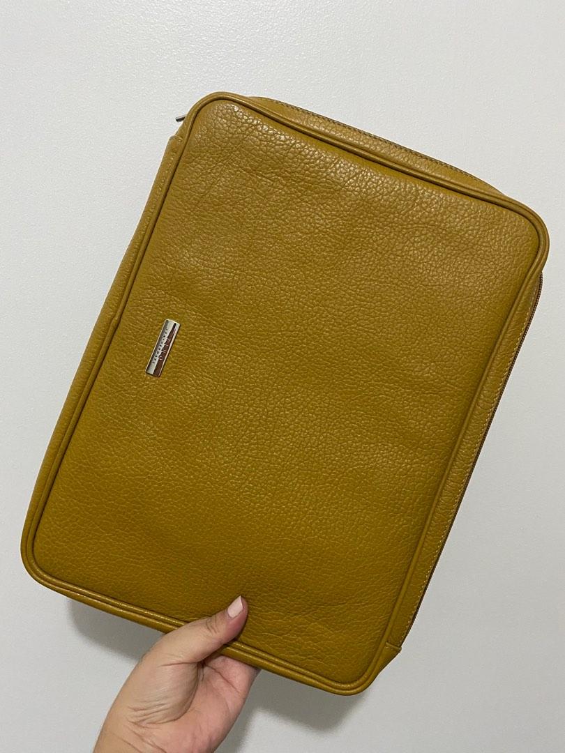 Fino Leather Laptop Case (Category: Laptop Bags & Sleeves) located in Mandaluyong City. Submitted by oursharedcloset (Listing ID 1194115415, Image 2). Description: Laptop sleeve Used only once. Original price: 5,595 Color: Mustard Size: L 13.5 x W 9.5 Fits my 15 inch laptop (diagonal measure), L 12.75 x w 8.5 RFS: decluttering.
