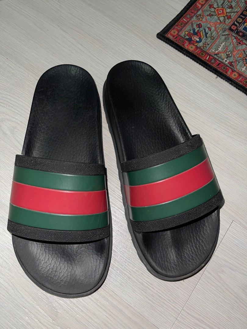 Gucci striped rubber slides store