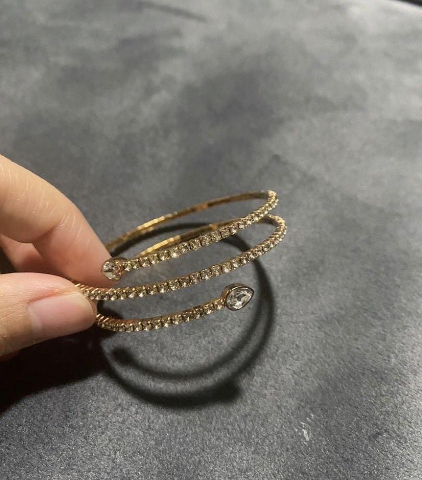 swarovski twist drop bangle in rose gold