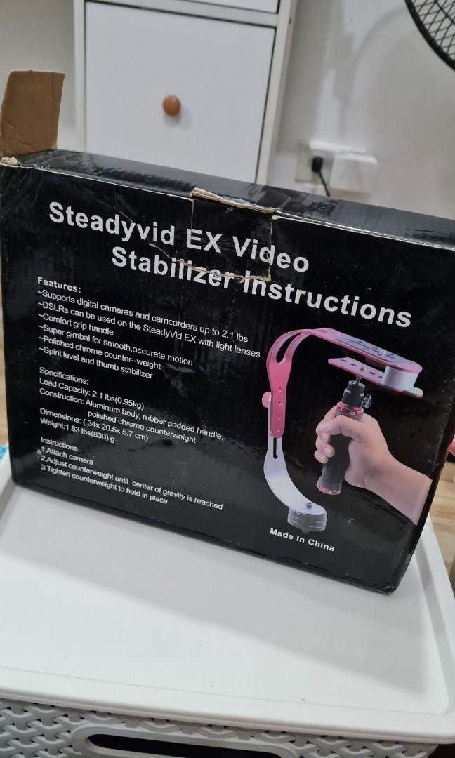 Video Stabilizer (Category: Camera Bags & Carriers) located in Quezon City. Submitted by cheskaxgonzales24 (Listing ID 1194079478, Image 1). Description: Never been used coz I already had a stabilizer. RFS: Decluttering.