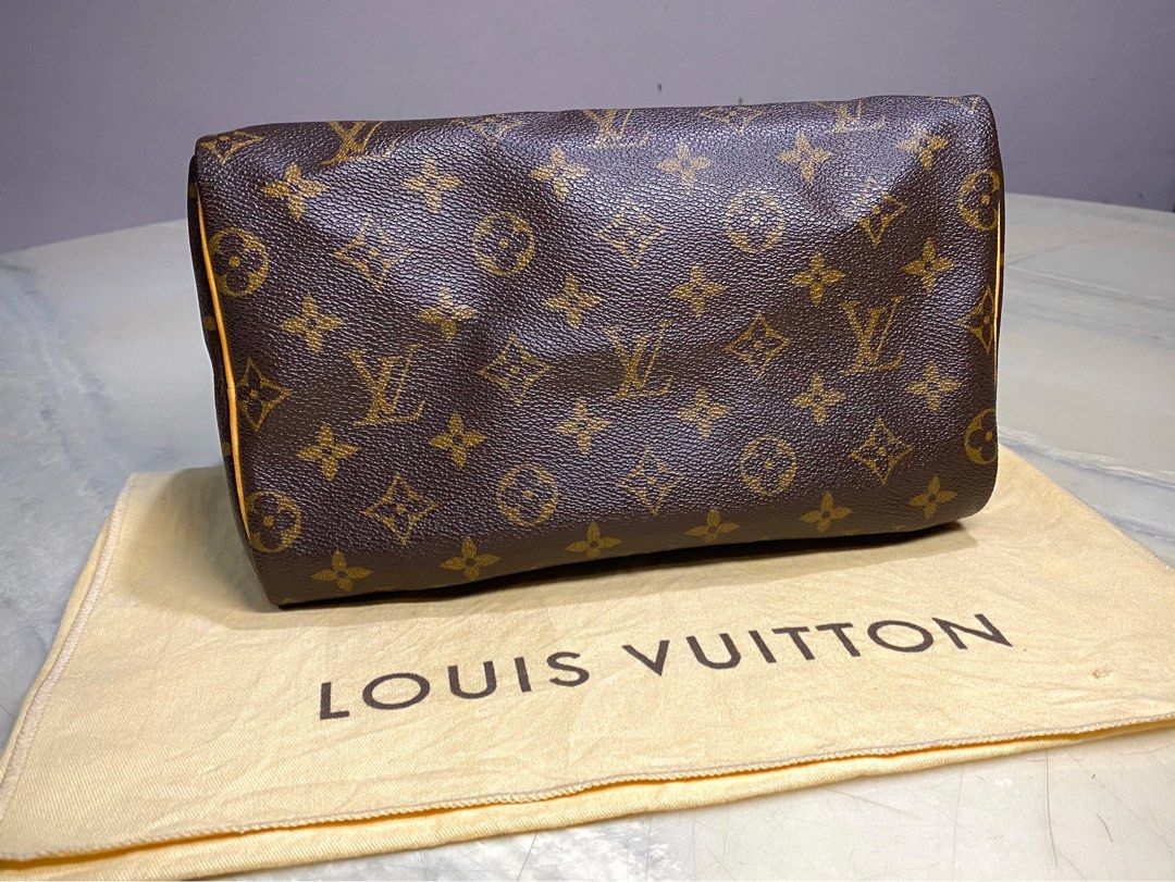 Louis Vuitton e, Authenticity Guaranteed
