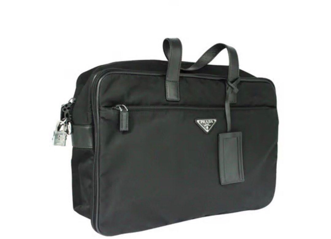 Authentic brand new Prada briefcase (Category: Bags & Wallets) located in Singapore. Submitted by hamlin32 (Listing ID 1195945280, Image 2). Description: Authentic brand new Prada black nylon briefcase. Packaging. Original .