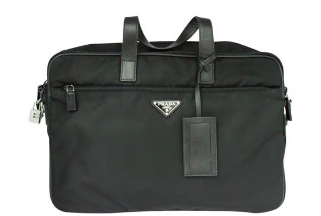 Authentic brand new Prada briefcase (Category: Bags & Wallets) located in Singapore. Submitted by hamlin32 (Listing ID 1195945280, Image 1). Description: Authentic brand new Prada black nylon briefcase. Packaging. Original .