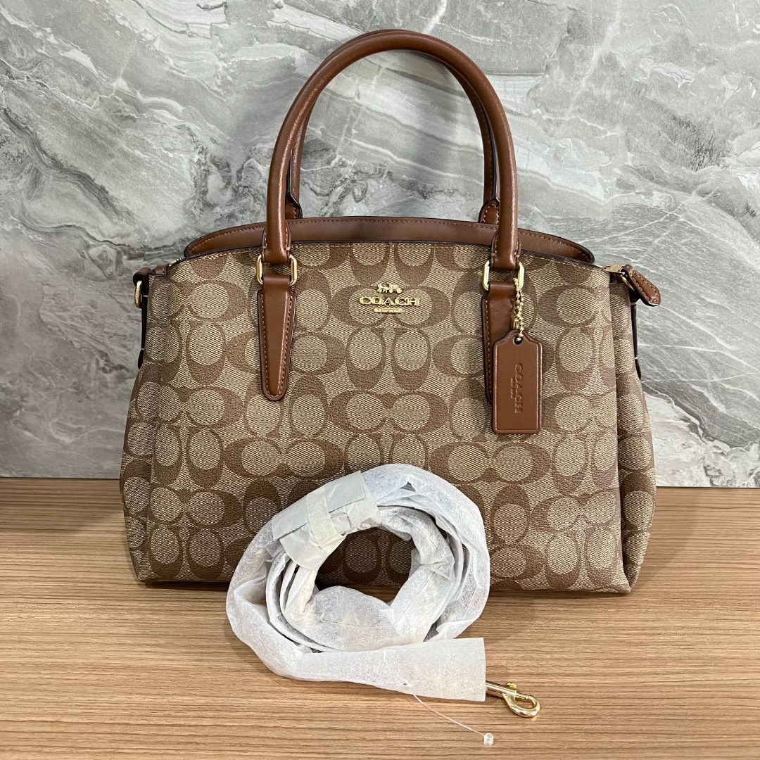 Coach hand hotsell wallets