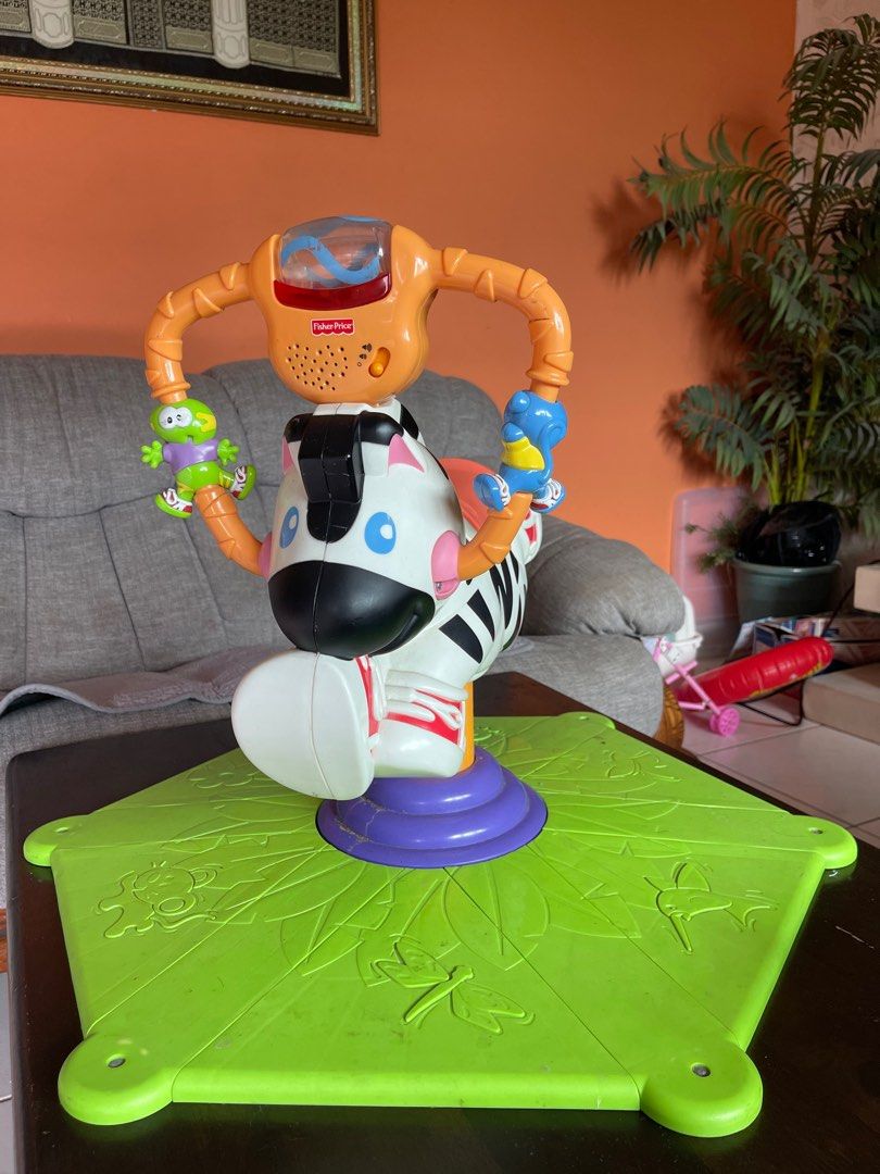 Fisher price bounce and spin deals zebra age range