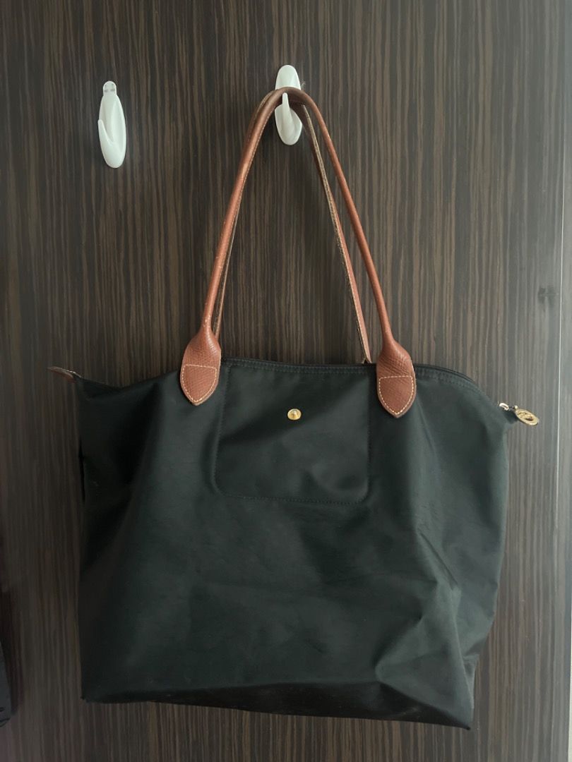 Black bag brown handles top
