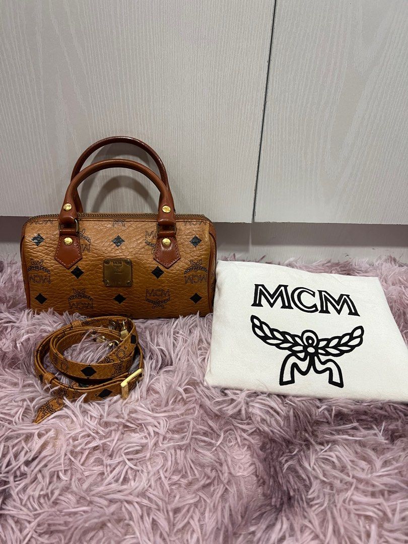 MCM Boston Nano (Category: Luxury Bags & Wallets) located in Quezon City. Submitted by hennessyscloset (Listing ID 1195807110, Image 1). Description: ❗️❗️LAST PRICE POSTED, DON’T CHAT IF YOU WILL ASK FOR A LAST PRICE ❗️❗️ Personal preloved MCM Nano, vintage condition, no flaws but with signs of usage. Please manage your expectations you’re buying a preloved item. No flaws unless it was stated here. Guaranteed authentic including the MCM sling(bou