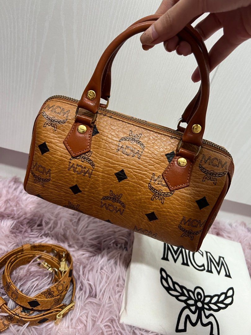 MCM Boston Nano (Category: Luxury Bags & Wallets) located in Quezon City. Submitted by hennessyscloset (Listing ID 1195807110, Image 2). Description: ❗️❗️LAST PRICE POSTED, DON’T CHAT IF YOU WILL ASK FOR A LAST PRICE ❗️❗️ Personal preloved MCM Nano, vintage condition, no flaws but with signs of usage. Please manage your expectations you’re buying a preloved item. No flaws unless it was stated here. Guaranteed authentic including the MCM sling(bou