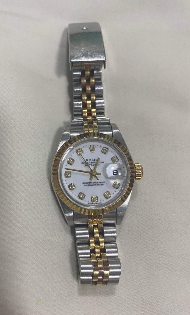 Rolex Datejust Ladies Diamonds (Category: Luxury Watches) located in Malabon City. Submitted by andies.closet (Listing ID 1195850610, Image 1). Description: Rolex Datejust Ladies Two-toned Big Diamonds white dial case size: 26mm year model 1997 condition: 9.5/10 watch with authenticity paper.