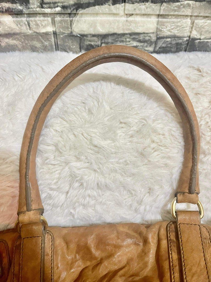 Authentic Givenchy Pandora Medium (Category: Luxury Bags & Wallets) located in Paranaque City. Submitted by sereneorganics (Listing ID 1196026641, Image 3). Description: 💯 Authentic Givenchy Pandora medium Color tan Overall condition of the bag is really nice but need a little cleaning (stocked) Pen marks inside Price is a bit negotiable No inclusions(bag only).