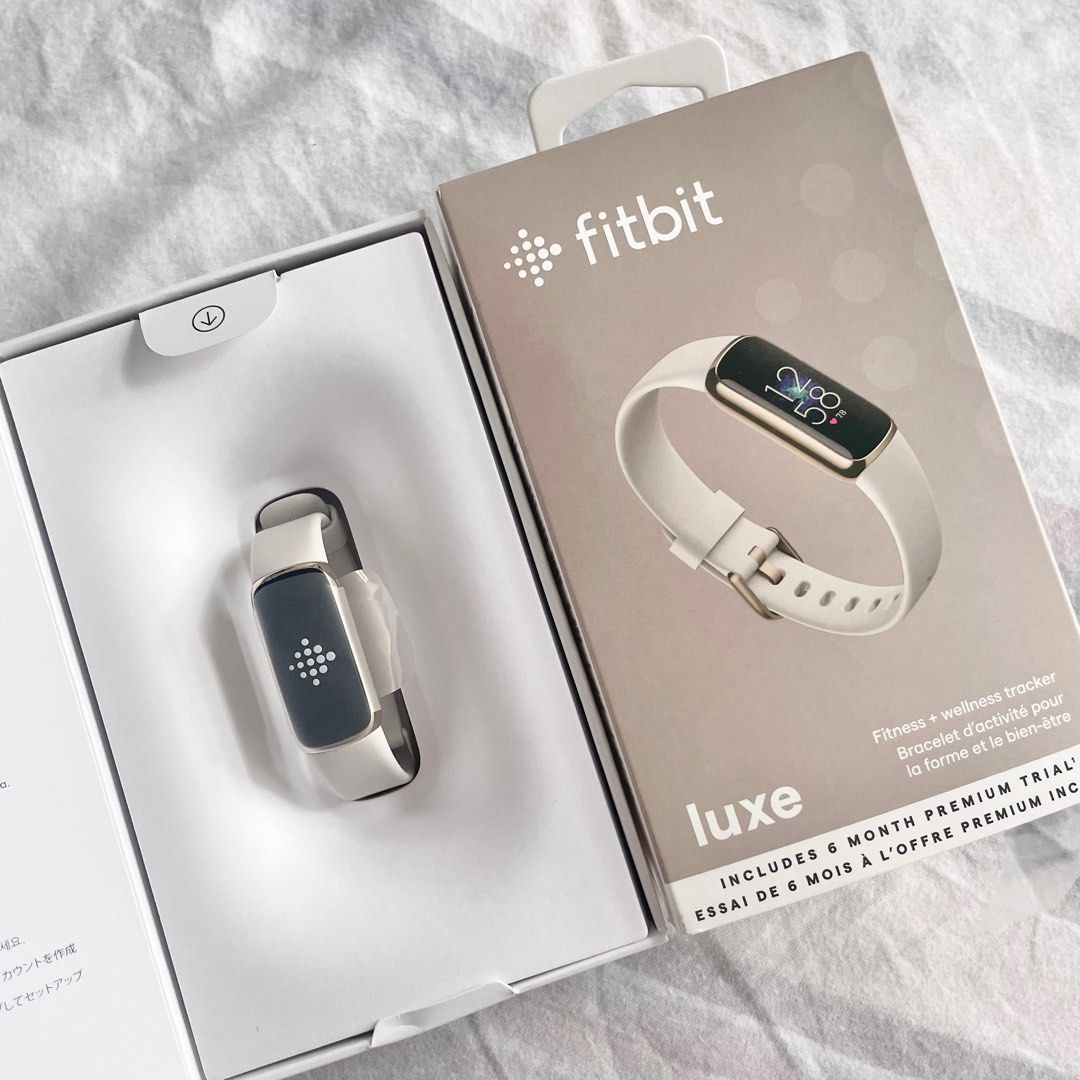 White and rose new arrivals gold fitbit