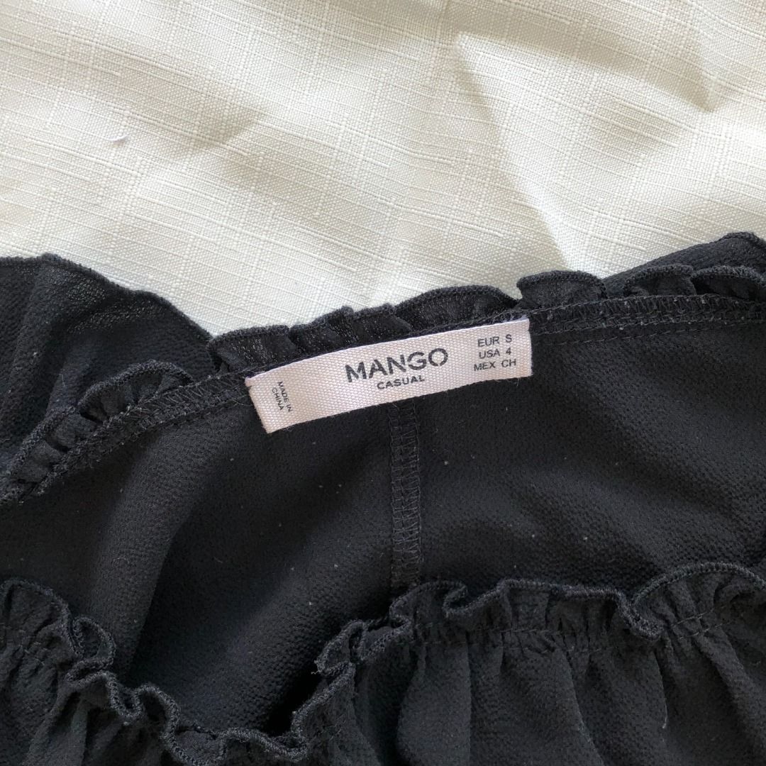 Mango Black Ruffled Top (Category: Sleeveless) located in Quezon City. Submitted by mccev (Listing ID 1196083700, Image 2). Description: Fits XS-M.