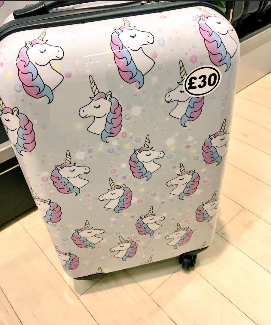 Unicorn suitcases primark store