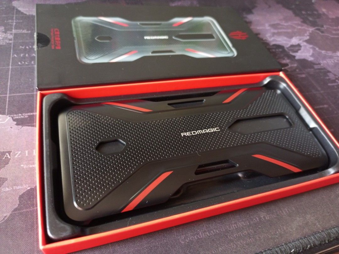 Red Magic 6 / 6 Pro E-sports case (Category: Cases & Sleeves) located in Cavite. Submitted by blitzpanel (Listing ID 1195997028, Image 2). Description: Bought this along with Red Magic 6S Pro. Only tried once on 6S Pro I think this is really designed on 6 / 6 Pro device Price: Give away price already Meetups ◈ Dasma ◉ District Imus ◉ Central Mall Salitran.
