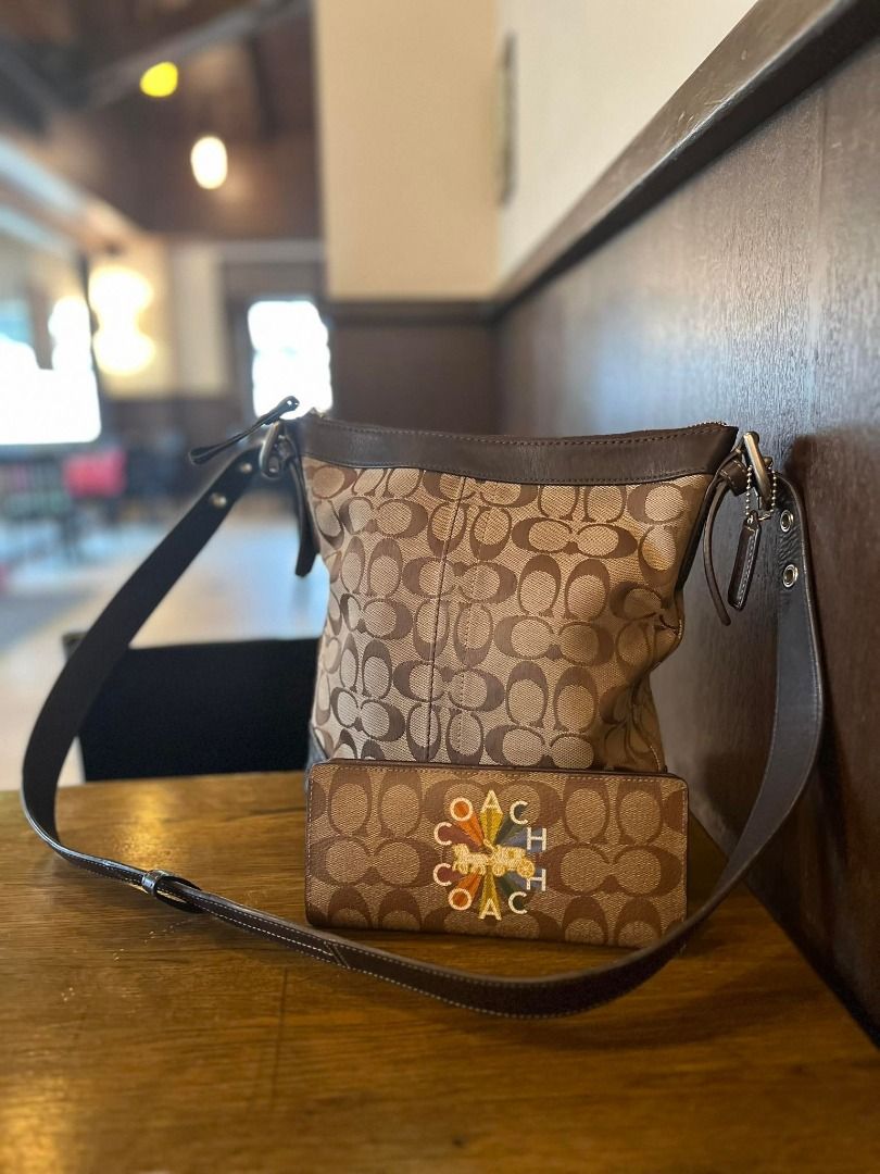 Authentic coach wallet and bag set (Category: Luxury Bags & Wallets) located in Quezon City. Submitted by annabellesmith12345 (Listing ID 1196301090, Image 2). Description: Authentic coach wallet and bag set Excellent used condition Sold as set 7000 only.