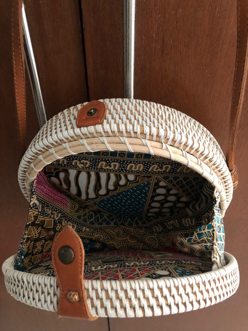 FREE! Bali rattan round bag (Category: Cross-body Bags) located in Pasig City. Submitted by dstarcloset (Listing ID 1196384547, Image 3). Description: •Bought in Bali, Indonesia pre-pandemic •Brand new •In excellent condition •Never been used •No damage •With minimal dark marks in the strap due to storage in closet for long time •Please see last photo with bottled juice for size reference •What you see is what you get •Shipping fee be will should