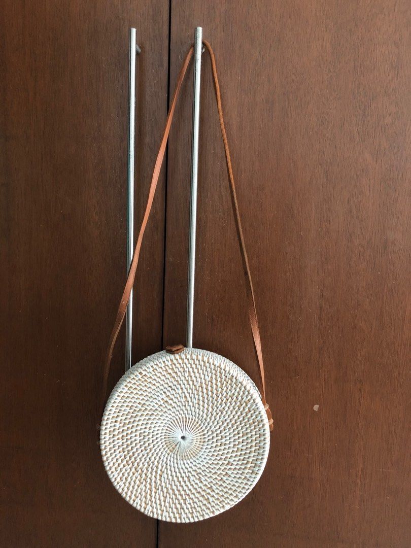 FREE! Bali rattan round bag (Category: Cross-body Bags) located in Pasig City. Submitted by dstarcloset (Listing ID 1196384547, Image 2). Description: •Bought in Bali, Indonesia pre-pandemic •Brand new •In excellent condition •Never been used •No damage •With minimal dark marks in the strap due to storage in closet for long time •Please see last photo with bottled juice for size reference •What you see is what you get •Shipping fee be will should