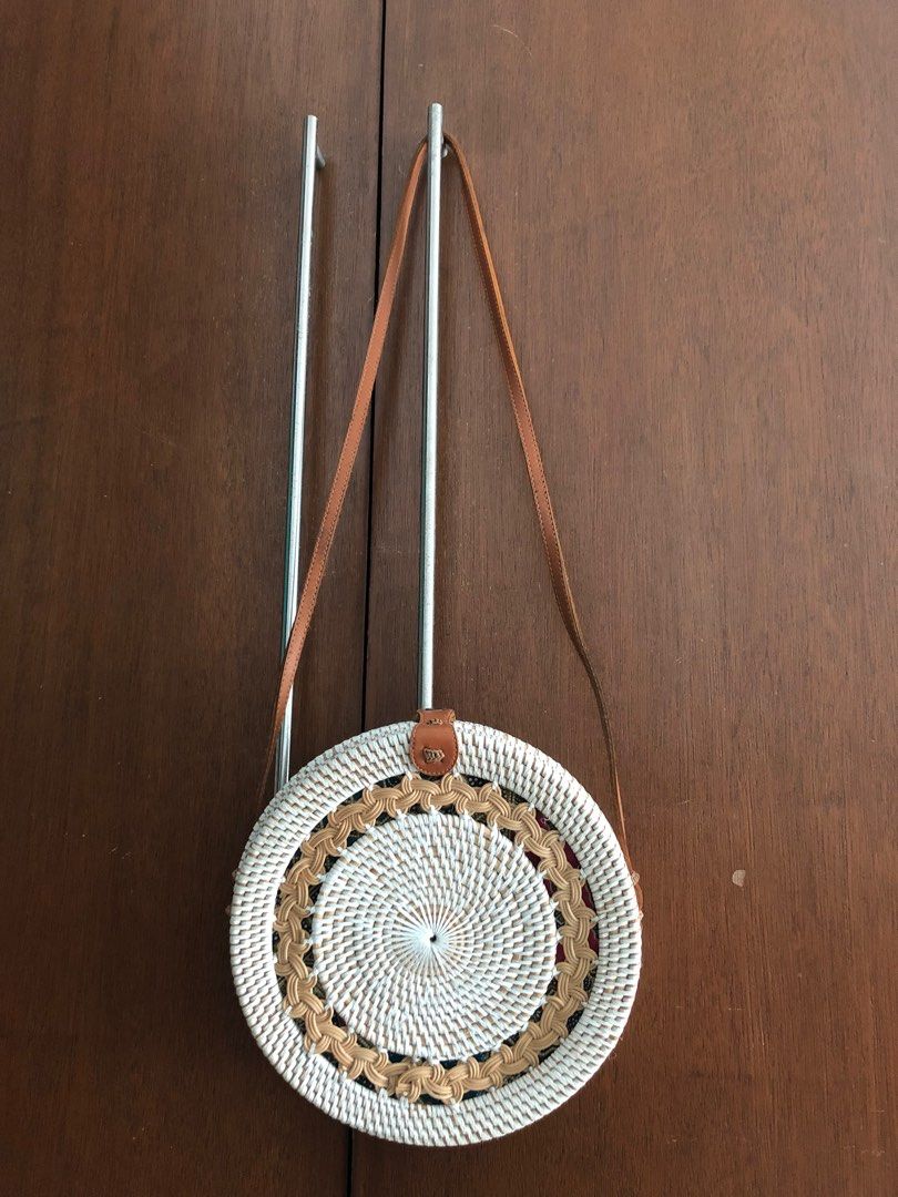 FREE! Bali rattan round bag (Category: Cross-body Bags) located in Pasig City. Submitted by dstarcloset (Listing ID 1196384547, Image 1). Description: •Bought in Bali, Indonesia pre-pandemic •Brand new •In excellent condition •Never been used •No damage •With minimal dark marks in the strap due to storage in closet for long time •Please see last photo with bottled juice for size reference •What you see is what you get •Shipping fee be will should