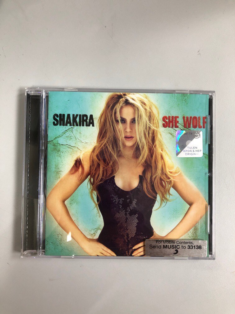 she wolf shakira album cover