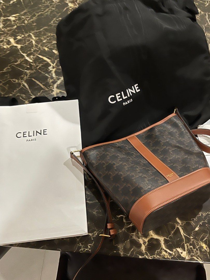 Celine Small Bucket Bag in White Triomphe Canvas and Calfskin Authentic,  Luxury, Bags & Wallets on Carousell