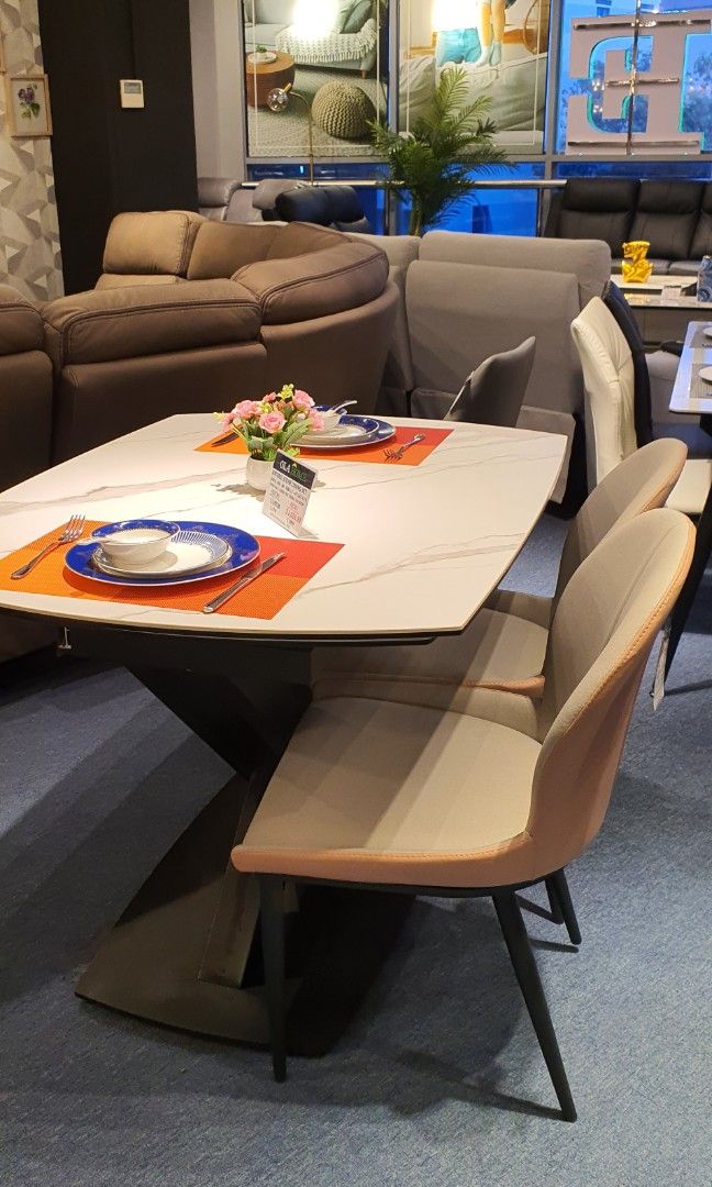 Dining Table (Category: Tables & Sets) located in Singapore. Submitted by n.linaaa (Listing ID 1196308786, Image 2). Description: Extendable dining table 1.35m in diameters; can extend into full circle. Table come with 2 dining chairs. White sintered top, guaranteed. had a change of mind after purchasing the item. Will receive by first week of March To arrange own transport from Sims Avenue. Thank you!.