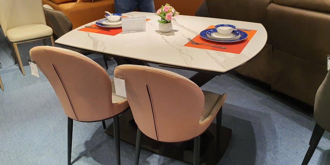 Dining Table (Category: Tables & Sets) located in Singapore. Submitted by n.linaaa (Listing ID 1196308786, Image 3). Description: Extendable dining table 1.35m in diameters; can extend into full circle. Table come with 2 dining chairs. White sintered top, guaranteed. had a change of mind after purchasing the item. Will receive by first week of March To arrange own transport from Sims Avenue. Thank you!.