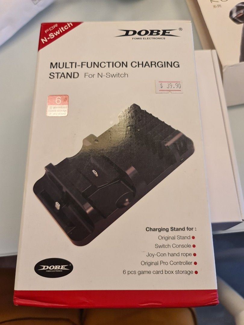 DOBE multi function charging stand (Category: Cables & Chargers) located in Singapore. Submitted by avgjoe (Listing ID 1196199786, Image 1). Description: for Nitendo switch.