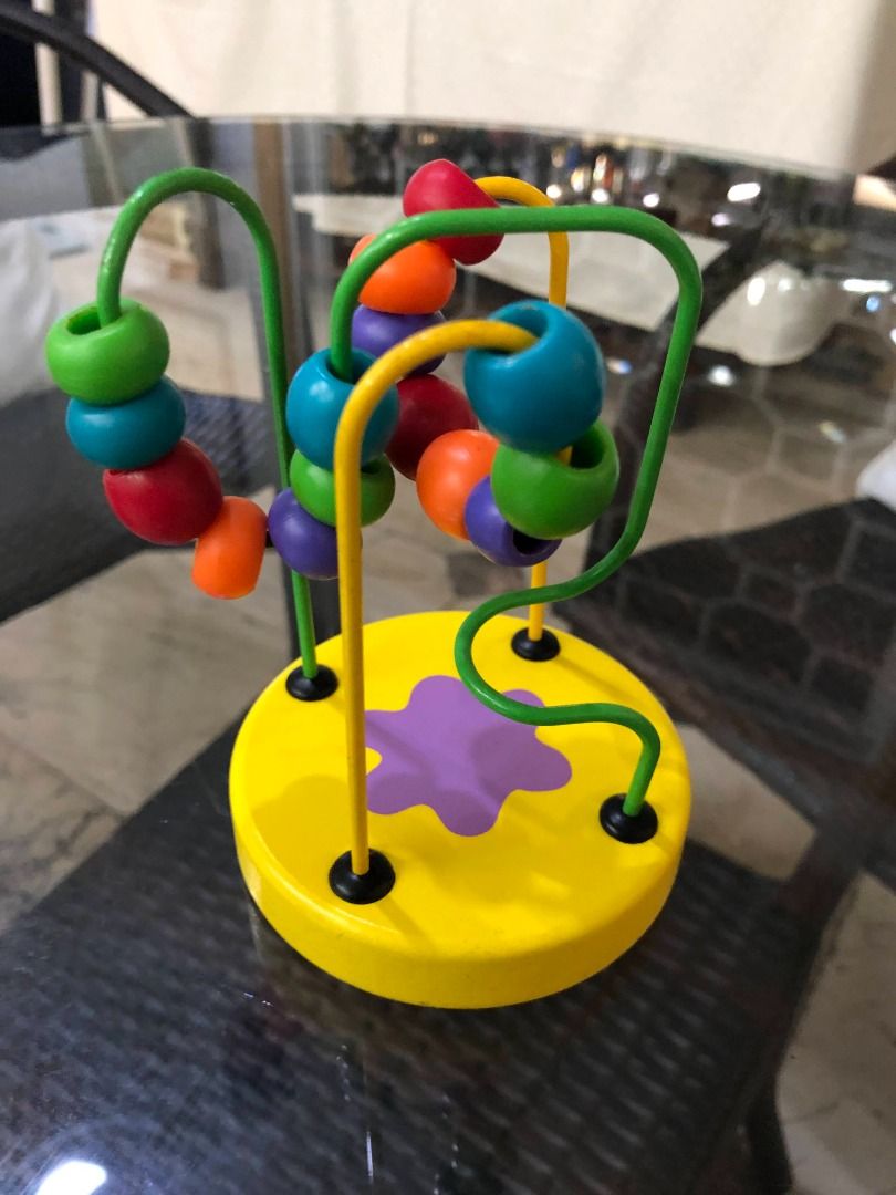 Kids Learning Wooden Bead Maze (Category: Infant Playtime) located in Quezon City. Submitted by outoftheboxph (Listing ID 1196288633, Image 1). Description: Toddler Baby Kids Early Learning 2 Lines Wooden Bead Cube Maze - Montessori Toys Condition: Used but not abused Made of safe and non-toxic wooden material, just use with reassurance. Item: Bead Maze Toy Material: Wooden Paint: Environmental protection water-based paint .