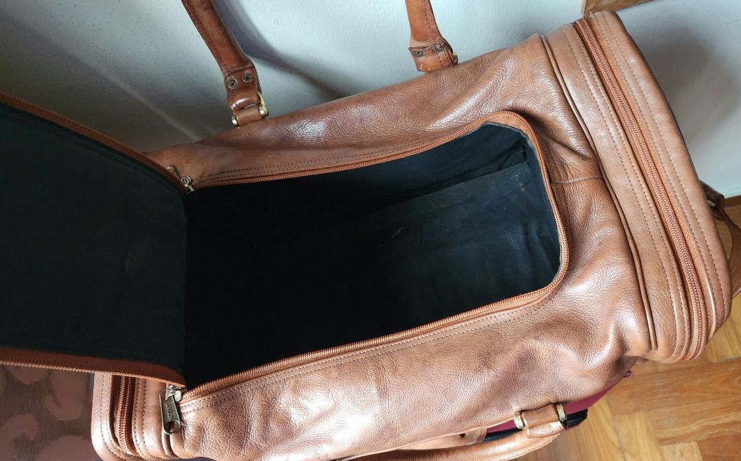 Leather duffel bag tan colour, Luxury, Bags & Wallets on Carousell