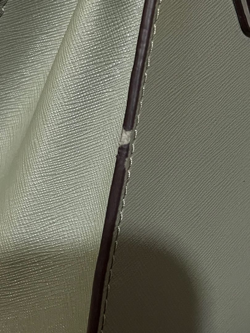 Michael Kors Mercer (Category: Luxury Bags & Wallets) located in Paranaque City. Submitted by vybash (Listing ID 1196314722, Image 3). Description: Selling this Preloved Michael Kors Mercer in Army green color Comes with Tag, Care Card and Gift Receipt. See photos for bag detail and flaw. .