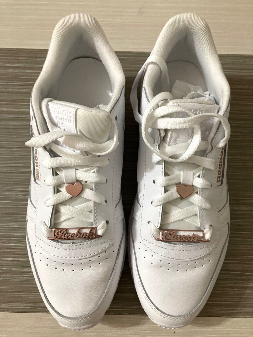 Reebok full discount white shoes