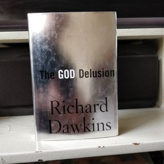 The God Delusion by Richard Dawkins (Hardcover - Like New)