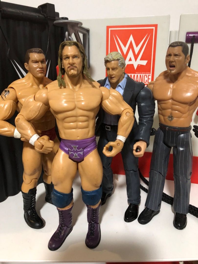 Wwe evolution action deals figures