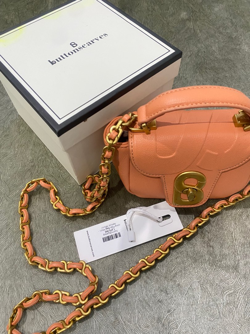 Our micro Alma Flap Bag in apricot and rose is a true statement