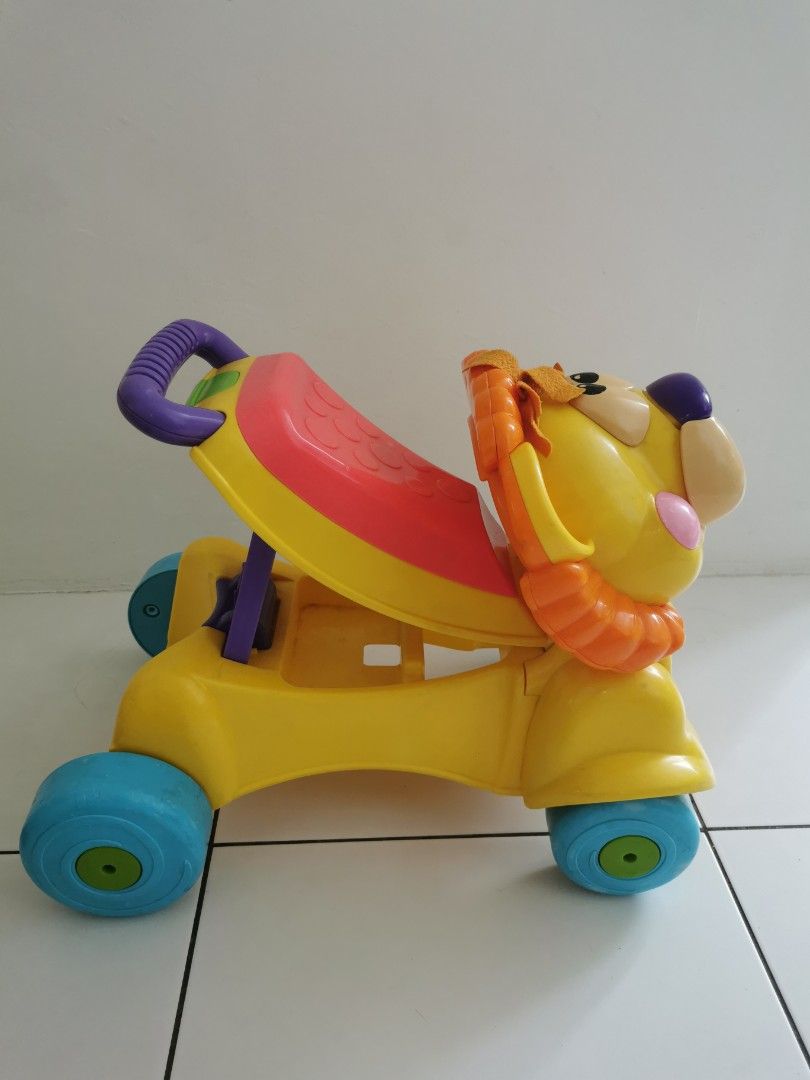 Trotteur lion fisher price outlet