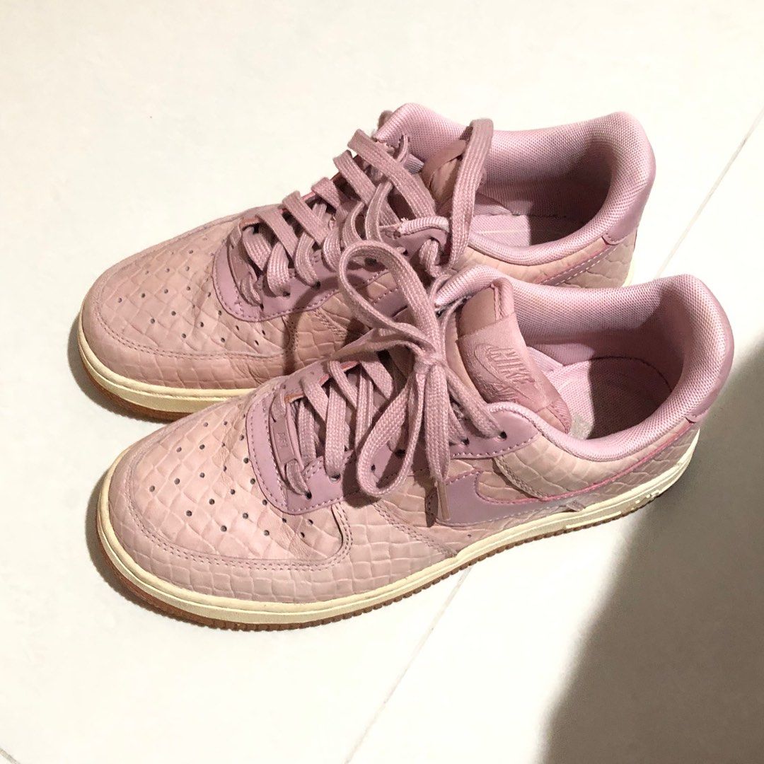 Pink leather nike shoes hot sale
