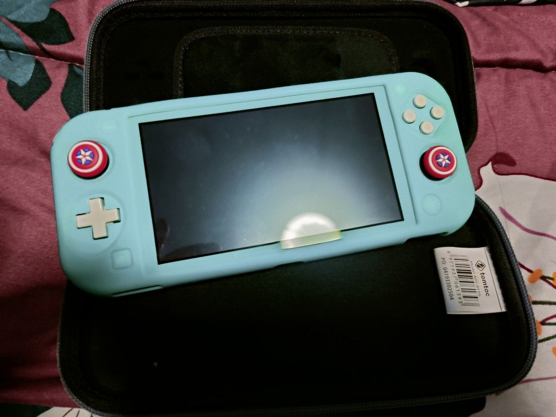 Nitendo switch lite tourquise, Video Gaming, Video Game Consoles