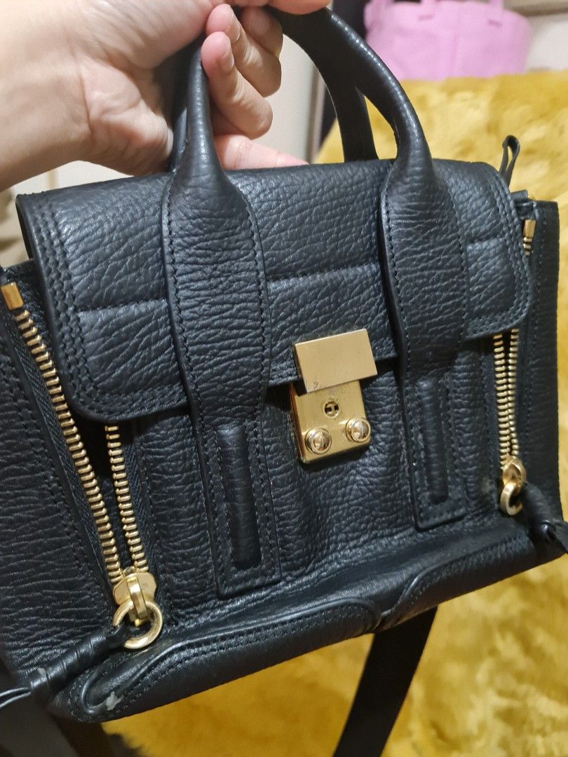 Phillip Lim Pashli mini (Category: Luxury Bags & Wallets) located in Pasig City. Submitted by 53888 (Listing ID 1196598838, Image 3). Description: Authentic Phillip Lim Pashli Mini with code replaced strap measurement: L11" x H 6" flaw: light scratch marks see last photos.