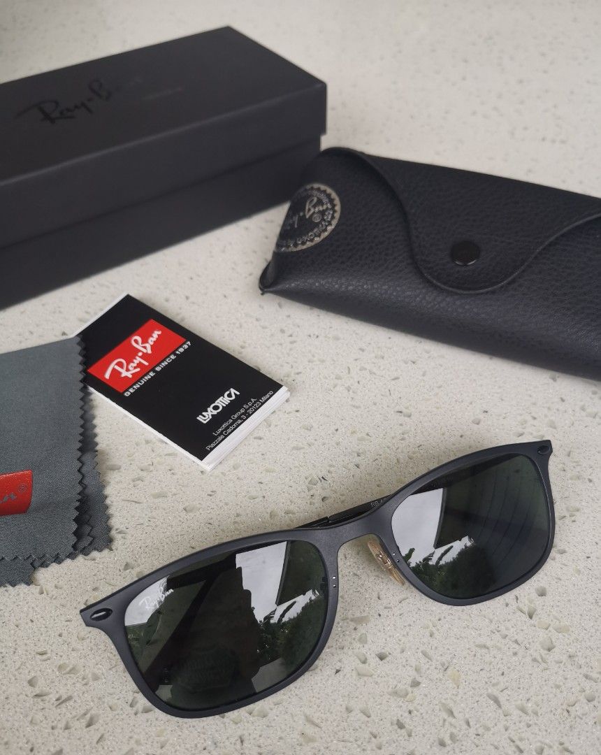 Ray-Ban Wayfarer Light Ray (Category: Sunglasses & Eyewear) located in Marikina City. Submitted by michelleaaa (Listing ID 1196414311, Image 1). Description: Authentic Black Size 52 Medium Complete with box No flaws Negotiable.
