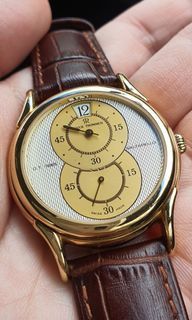 Revue Thommen - jumping hour 18k solid gold