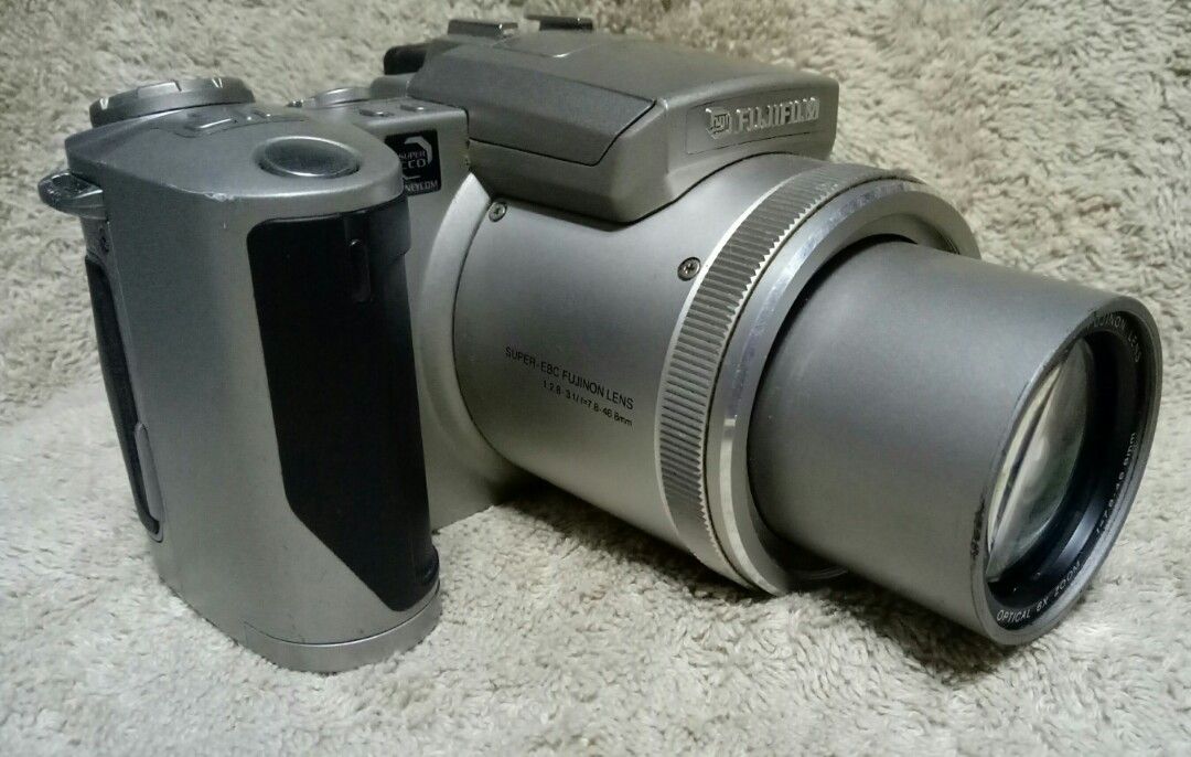 Vintage Fujifilm Digital Camera For Display (Category: Cameras) located in Quezon City. Submitted by Mr._Vintageous (Listing ID 1196595893, Image 3). Description: For Sale. Fujifilm Finepix 4900z Bridge Digital Camera Body Only. 2.4 Megapixels Vintage Digital Camera. Untested Item. It may or may not work. Good for collection. Buy at your own Risk.Made in Japan. Uses NP-80 Lithium Ion Battery (No Battery). No Charger. Uses SmartMedia Memory Card (