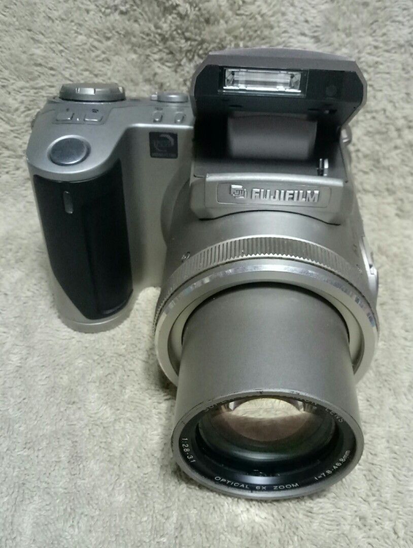 Vintage Fujifilm Digital Camera For Display (Category: Cameras) located in Quezon City. Submitted by Mr._Vintageous (Listing ID 1196595893, Image 2). Description: For Sale. Fujifilm Finepix 4900z Bridge Digital Camera Body Only. 2.4 Megapixels Vintage Digital Camera. Untested Item. It may or may not work. Good for collection. Buy at your own Risk.Made in Japan. Uses NP-80 Lithium Ion Battery (No Battery). No Charger. Uses SmartMedia Memory Card (