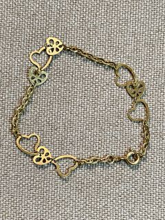 18 karat chain bracelet with heart cutouts