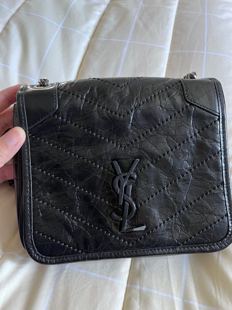 Ysl niki bag on sale fake vs real