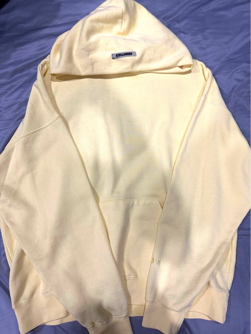 Fear of god essentials on sale lemonade pullover hoodie yello