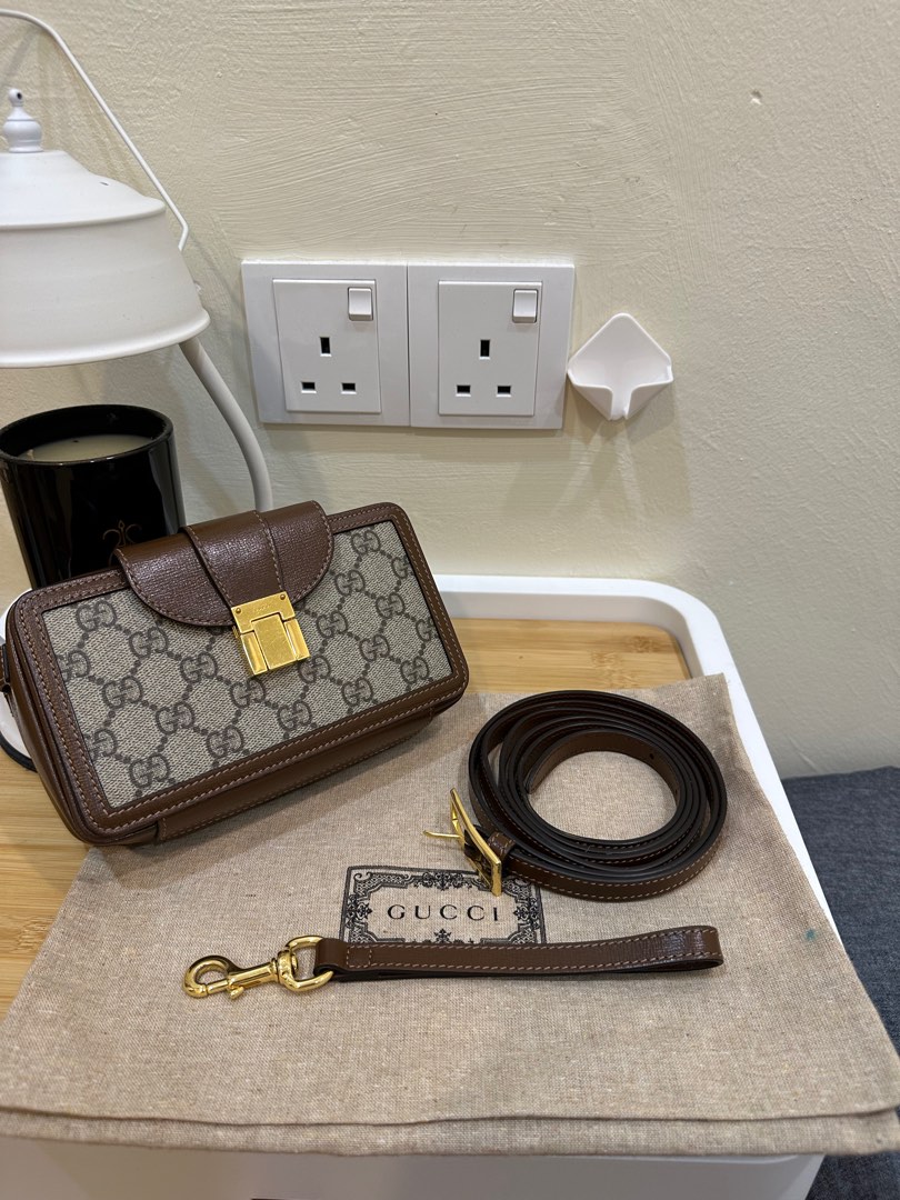 Gucci gg mini best sale bag with clasp closure